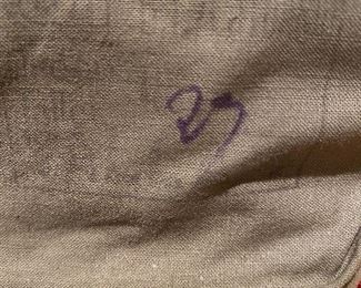 Lot 6204. $25.00 Youth or Man's Hat, vintage with button over top in a military khaki green with red trim and tassel, and set of Brass Bells, (7) in staggered sizes and sounds - hang in door opening. Vintage.