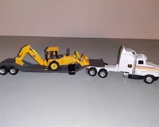 ERTL KENWORTH T600A with FLATBED TRAILER Made in USA with Backhoe Hauler