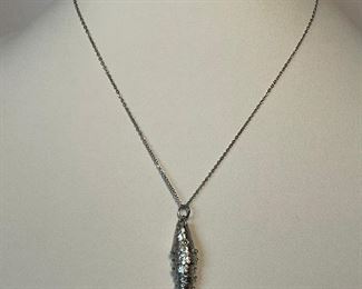 sterling silver fish necklace - chain around 18 inches in length - price 20 dollars 