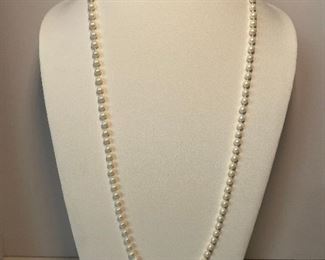 faux pearl necklace - 31 inches in length - price 10 dollars 
