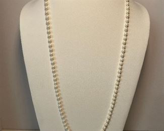 faux pearl necklace - 31 inches in length - price 10 dollars