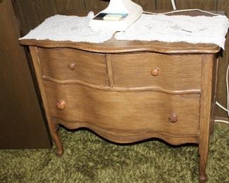 serpentine-front washstand/chest