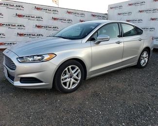 #110 • 2015 Ford Fusion 2015 Ford Fusion CURRENT SMOG SEE VIDEO
CURRENT SMOG
SEE VIDEO
Year: 2015
Make: Ford
Model: Fusion
Vehicle Type: Passenger Car
Mileage:  52,627
Plate: 7JXX019
Body Type: 4 Door Sedan
Trim Level: SE
Drive Line: FWD
Engine Type: L4, 1.5L; DOHC 16V; Turbo
Fuel Type: Gasoline
Horsepower: 181HP
Transmission:
VIN #: 3FA6P0HD5FR225929
Smog:  $60
Doc Fee:  $70
DMV Registration Fee:  $791

Features and Notes:
sold on application for duplicate title, power windows, power seats, ice cold A/C
