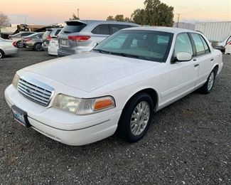 #240 • 2003 Ford Crown Victoria CURRENT SMOG
SEE VIDEO
Year: 2003
Make: Ford
Model: Crown Victoria
Vehicle Type: Passenger Car
Mileage: 83171
Plate:  none
Body Type: 4 Door Sedan
Trim Level: LX
Drive Line: RWD
Engine Type: V8, 4.6L (281 CID); SOHC 16V
Fuel Type: Gasoline
Horsepower:
Transmission:
VIN #: 2FAHP74W63X170428
Doc Fee:  $70
Smog:  $60
DMV Registration Fee:  $388

Features and Notes:
sold on application for duplicate title,