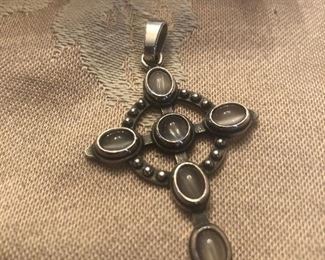 retired james avery sterling and moonstone cross -recently polished at the  avery store  