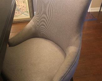 front of gray chairs