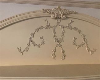 Decorative overlay design on the french style shelving unit