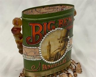 Tin purse dressed in bling and lined with a map