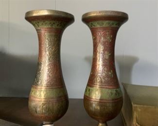 Brass flutes. About 8" tall