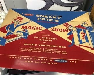 Sneaky Pete's Magic Show Set. Includes all the pieces including the sword. This is in fantastic condition for the age.