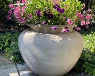 Concrete planters - 2 available. Each measures 21"H.  The diameter of the opening is 19". 