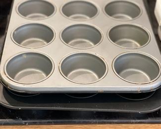 Assorted Muffins and Baking Pans.