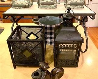 A variety of candle holders! $28.00 metal squirrel 6W 6H. $12.00 Black lantern 5.5W 13H. $12.00 Black square with glass diamonds (could be used as a planter) 7W 7.5H. $24.00 Set of three with glass inserts 5W 6H.