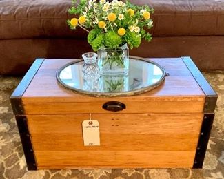 $150.00 Wooden trunk with metal handles/edges. Great condition. 27.75W 13.5D 13.75H. Special thanks to Daily Flowers for the fresh floral arrangement!