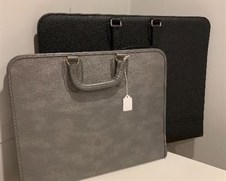 Art portfolios. $10.00 gray one, 17W 13H. $8.00 black one, 22W 17H. Excellent condition.