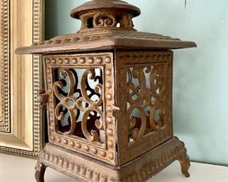 $28 Cast iron votive holder