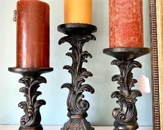 $30 Set of 3 pillars with pillar candles. Pillars range 8-12 inches high.