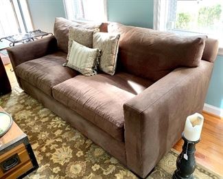 $800 Crate and Barrel brown sofa. Measures 86l x 42w x 32h. $400 for a matching chair measuring 47l x 42w x 32h.