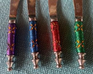 #1050A  Set of 4 festive cheese knives, $2