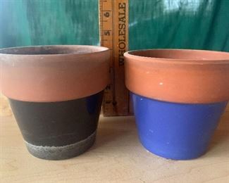 #1060B. Two clay pots, painted $4