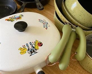 Great kitchen items!  Look at that retro kitchenware and cast iron skillets!