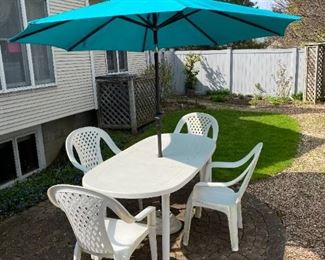 Plastic Picnic Table w/ Umbrella, umbrella stand, and 4 Chairs