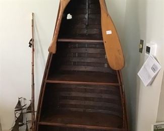 Half Canoe shelf unit. So popular. Paddles included.