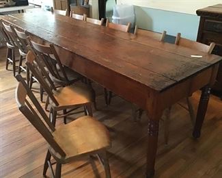 Amazing 9 1/2' long farm table! 3 board top.   Set of 14 plank seat chairs. 