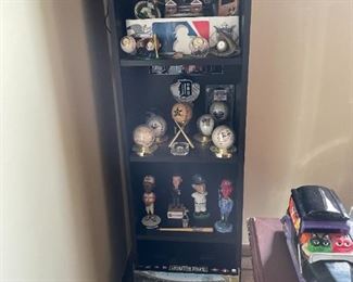 . . . the other shelving unit filled with baseball memorabilia
