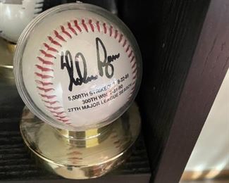 . . . a Nolan Ryan stamped autographed ball
