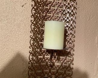 . . . one of a pair of matching sconces