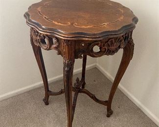 Antique table measures 19”D x 27”H