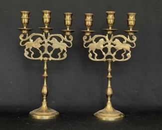 Vintage brass candlesticks with lions