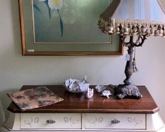 Bombay chest; framed orchid  art; precious lamp