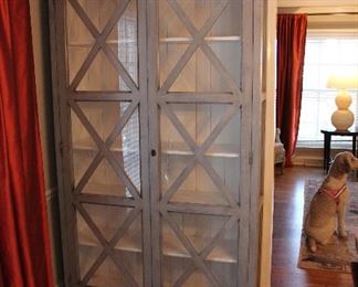 Lovely modern glass door display and storage cabinet.
