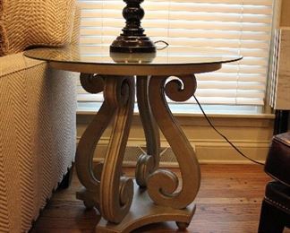 Classic scroll legged size table with glass top.