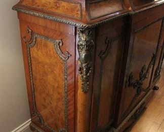 Detail on French piece, marble top is absent