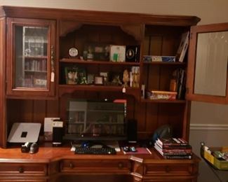 Executive credenza with computer screen, accessories, office supplies