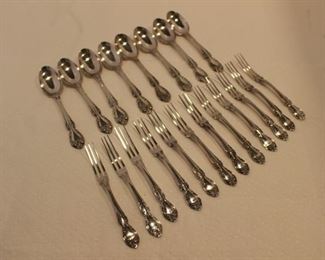 Strawberry forks and 5:00 or coffee spoons.  All sterling and part of the set