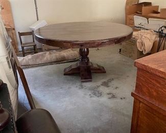 VERY LARGE ROUND DINING TABLE FROM DESIGNERS SHOP IN GREENVILLE. SEATS 8+