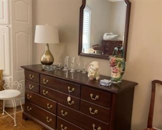 DRESSER IN MASTER BEDROOM. BEAUTIFUL MIRROR