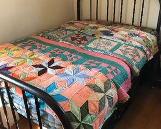Antique iron bed with 5-handmade quilts
