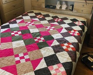 Mid-Century Modern bed with handmade quilt