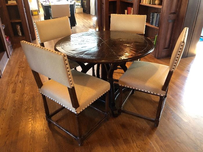 Charles Pollock dining table measuring 60” diameter x 29” high  and (4) Dennis & Leen Louis XIII side chairs measuring 21” wide x 21” depth x 37” high x 19” seat height 