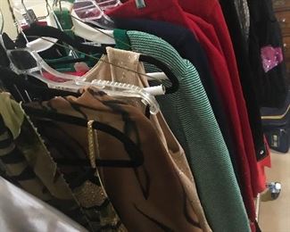 Many beautiful designer gowns and suits...