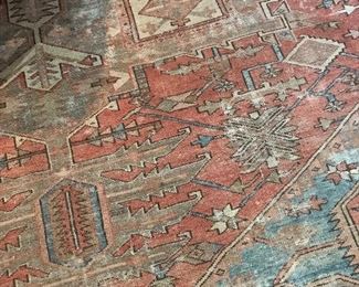 150 year old Heriz rug in beautiful muted tones of blue and terracotta.
A true antique rug!