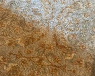 Very old Oushak rug in lovely shades of gold and cream.