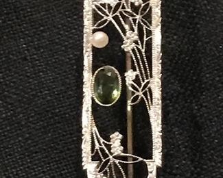 Delicate white gold brooch with seed pearls and green tourmaline 
