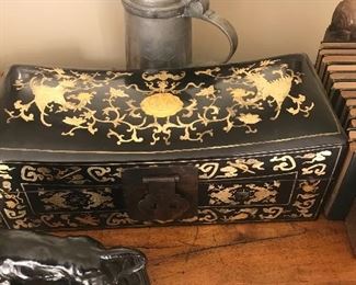 Large crescent box in ebony with ivory inlay.