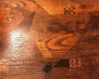 Inlay on tray table top